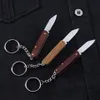 Mini cuchillo clásico con mango de sándalo, llavero portátil para exteriores, Cuchillos plegables, mochila de bolsillo portátil para acampar, herramienta EDC