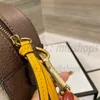 高品質のデザイナーバッグ女性Luxurys Tiger Camera Handbagsメタリックビーズトートショルダーバッグ