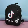 Tik Tok Designer Backpack Girls Boys Kids Fashion School Bag Letters Printed Students Backpacksキャンバスショルダーバッグクロスボディバッグ1346515