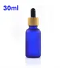 Wholesale 100pcs 30ml frosted amber blue green glass dropper bottle with bamboo cap packaging scale droppers SN5347