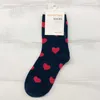 7 pais / grup kadın çorap sevimli aşk kalp pamuk çorap Harajuku vintage kadın komik mutlu roman tatlı baskı çorap Toptan 210720