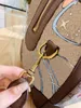 حقيبة داكز للأمتعة اليدوية للرجال والنساء مع حقيبة اليد المطبوعة للكرتون للجنسين أكياس دافل حقيبة يد جلدية Boston243i