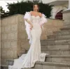 イブニングドレス女性の布の恋人岬の羽のロングドレスキム・カーダシアン・キリ・ジェンナーYouSefアルジャスミー・カンヌ映画祭