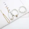 Perlé, brins de perle de verre bracelet à la main bijoux glands féminin féminin perlé disque quadruplé ensemble en gros anime de luxe