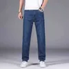 SHAN BAO Jeans elasticizzati leggeri larghi dritti Estate Stile classico Business Casual Jeans sottili da uomo giovane 211108