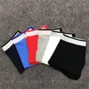 Moda Sport Nome popolare Slip da uomo Slip da uomo in cotone Boxer Pantaloni colorati stile caldo Tre linee Boxer Lettera