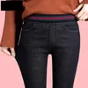 kvinnors svarta stretch jeans