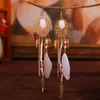 Boho feuille plume gland boucle d'oreille thaïlande bijoux Vintage ethnique été or longue chaîne alliage creux boucles d'oreilles pour les femmes