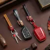 Nyckelringar vintage läder bil-knappkakain high-end handband-knapp kedja hängande spänne män kvinnor personlighet kreativ presentförpackning