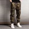 Mäns Jeans Streetwear Mode män Multi Fickor Designer Casual Cargo Pants Overaller Hip Hop Joggers Militär Camouflage Byxor