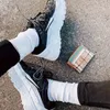 Chaussettes à hommes blancs noirs femmes hommes de haute qualité coton tout-correspondant classique Hook Hook Breathable Mélanger le football Basketball Sports Sock