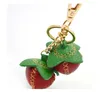 Portachiavi di design di lusso Straberry in pelle di vacchetta carino per la creazione di accessori per gioielli da donna Borsa regalo di fascino Porte Clef Femme H0915