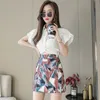 Short skirt women's half-length skirt spring fashion high-waisted A-line package hip culottes spring abstract picture 210412