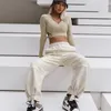 Pantalones de dos piezas para mujer MUICHES Estilo Safari Conjunto de mujer Manga de murciélago Suelta Corta con capucha Cintura elástica Cargo Bolsillo Streetwear Sólido Básico A