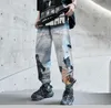 Streetwear trending hip hop grafiska jogger byxor oldschool män trend nasa astronaut slacks löst-fitty kvinnor ins