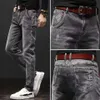 Baozhuo mäns stretch passform jeans vår sommar affärer avslappnad mode skinny jeans 10 stilar svart blå grå klassiska byxor 211011