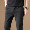 Automne hommes Slim Stretch pantalons décontractés affaires mode couleur unie pantalon mâle marque noir bleu marine gris 210715