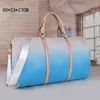 Haute qualité dégradé couleur mode grande fleur hommes femmes voyage sac duffle cuir bagages sacs à main grande capacité sport 50cm multicolore