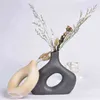 Nordic Round Hollow Ceramic Vase Donut Half-length Woman Office Desktop Living Room Interior Decoration Home 211215