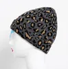 レディースウィンターヒョウハットファッション女性ウールの暖かいニット帽子動物のプリントビーニーキャップゴロスムヤーヴェルノ厚さのボンネットGC708