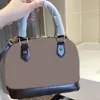 Bolsa de ombro de luxo de couro superior estilo clássico com zíper bolsa de concha feminina venda por atacado bolsas crossbody femininas de alta qualidade carteira designer 2021