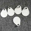 Xiruoer-100 pcs T5577 Key FOBS 125KHz T5577 Gravável KeyFob RFID Tag Access Access Card Chave FOB Token Anel ID Proximidade Tags