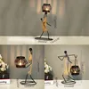 Strongwell Nordic Metal Candlestick Caráter Abstrato Sculpture Candle Candle Decoração Figuras Feitos Feitos Handmade Home Decoração Arte Presente H1222