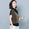 Printemps nouveau style de mode pour femmes européen imprimé léopard chemise épissé col haut manches chauve-souris chemise de fond en soie brillante 12852 210417