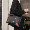 Fabrik Großhandel Männer Handtasche coole Dekoration Herren Tasche Persönlichkeit Niet Punk Handtaschen lässige Leder Mode Handtaschen