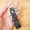 Keychains 빈티지 엠보싱 브라운 가죽 소 가죽 손목 장선 키 반지 카우걸 선물