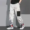 ヒップホップファッションパンツ日本の街路壁のズボングラフィックハイストリートスウェットパンツ男性春のロングブラックパンツスタイリッシュな服211008