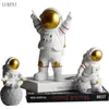 Nordic Creative Spaceman Astronaut Small Ornaments Resin Light Luxury Children's Room TV Cabinet Soft Decoration Gift 210414