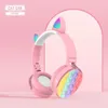 Dekompression leksak katt öron stereo relief silikon trådlöst fidget slips färgämne regnbåge headset gåva