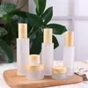 Frosted Glass Cream Jar Cosmetische lotion spuitpomp fles met geïmiteerde houten deksels navulbare container 20ml 30ml 40ml 60ml 80 ml 100 ml verpakking flessen