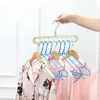 Cabides racks rack de secagem 9 orifícios Multifunction Roupas de roupas de plástico, economia de armazenamento de armazenamento organizador de armário dobrável