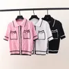 Summer Lightweight Stickad T-shirt Kvinnors Mode Lapel Kortärmad Cardigan Pocket Design Rosa Kort Loose Woolen Coat 210623