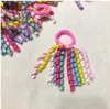 Porte-queue de cheval fille korkers rubans bouclés banderoles corker cheveux bobbles arcs fleur élastique boosters scolaires