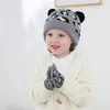 パーティーの帽子ヒョウのプリント子供の帽子グローブセット暖かいお祝いスカルキャップクリスマス赤ちゃんニット帽子T2I52978