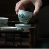 Xícara de chá vidrada em pedra azul antiga Tigela de degustação de cerâmica japonesa pequena com cheiro