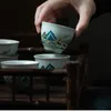 Tasse à thé émaillée bleue en pierre antique Petite tasse à thé en céramique japonaise sentant le bol de dégustation