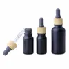 Matte Black Glass e liquid Essential Oil Perfume Bottle with Reagent Pipette Dropper and Wood Grain Cap 10/30ml RRF11410