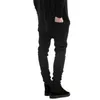 Mężczyźni Black Ripped Skinny Jeans Hip Hop Swag Denim Porysowany Rowerzysta Jeans Joggers Spodnie Znane Marka Designer Mężczyźni Spodnie 211206