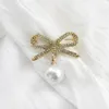 Épingles, broches élégantes nœuds d'arc incrusté strass broche suspendue imitation perle pour femmes brillant bowknot manteau accessoires bijoux