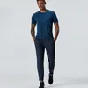 Mäns 2023 designer långa byxor sport kör anjuster yoga utomhusfickor smala passformade tröjor pant jogger casual elastic midje gym sportig 64wn