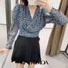 Женщины Chic Fashion Floral Print Подрезанные блузки с длинным рукавом назад Эластичные подол Женские Рубашки Топы 210420