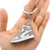 Creative 1/6 Hollow 3d Sneakers Model Keychains Souvenirs Basketball Shoes Sports Enthusiasts Keyring Car Backpack Pendant Gifts G1019 YGFE