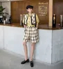 Pantalones cortos informales de pierna ancha de cintura alta de verano a cuadros amarillos para mujer cómodos coreanos 210427