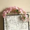 Couronnes de fleurs décoratives fausse soie glycine tenture murale rotin clou de girofle artificiel décoration de la maison décor de fête de mariage fleur vignes Garlan