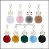 Fashion Pompom Christmas Key Chain Women Bag Aessories Decorative Pendant Faux Fur Rings Glass Beaded Snowflake Keychain Keychains Drop Deli