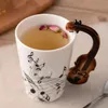 Música criativa Estilo violino Guitarra Caneca de cerâmica Café Chá Leite Taças com alça Café Novidade Presentes